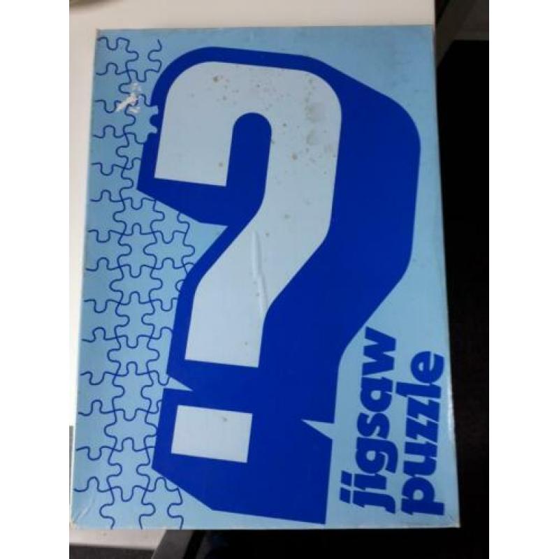 vraagteken legpuzzel. Je weet niet wat je legt. Wel fleurig