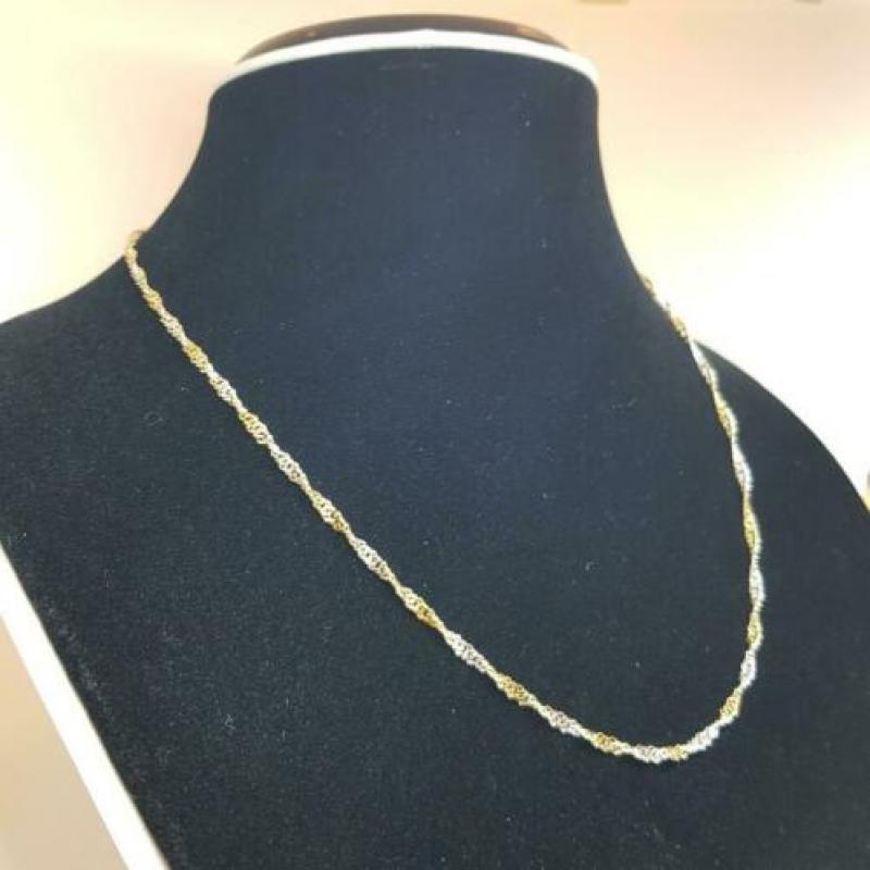 14 karaats bi-color wokkelketting witgoud en geelgoud