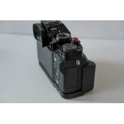 Fujifilm XT-1 + 2 grips + Fujifilm 56mm 1.2, goede staat.
