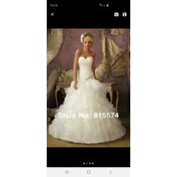 Mooie witte mermaid trouwjurk maat M/L