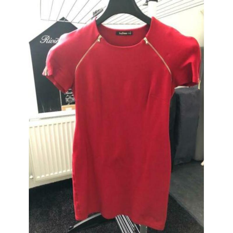 Te koop rood tricot jurkje