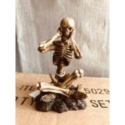 beeldjes, skull, horen zien en zwijgen, verzekemeling, hobby