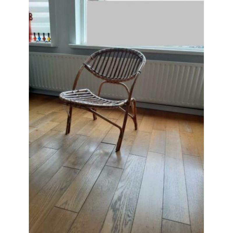 Bijzonder model vintage design Rohé rotan stoel met kussens