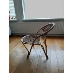 Bijzonder model vintage design Rohé rotan stoel met kussens