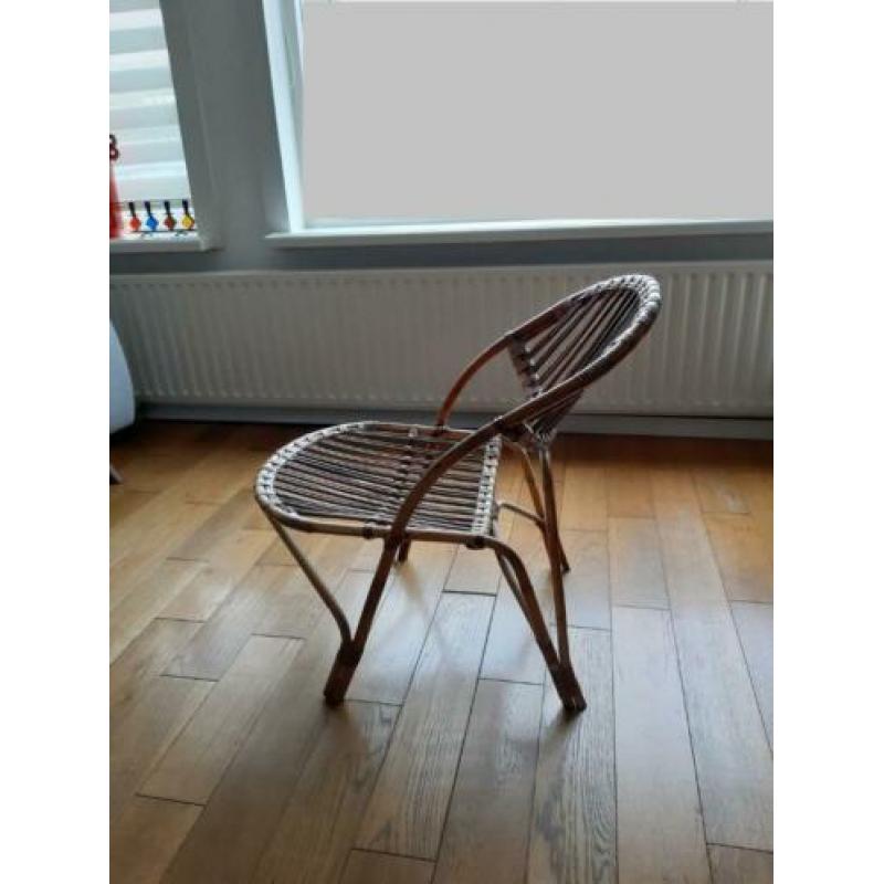 Bijzonder model vintage design Rohé rotan stoel met kussens