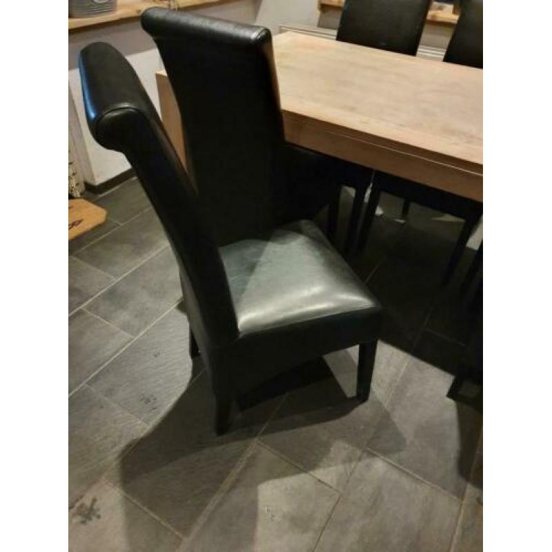 Te Koop eethoek met 6 zwarte stoelen. Maat tafel : 90-1.80