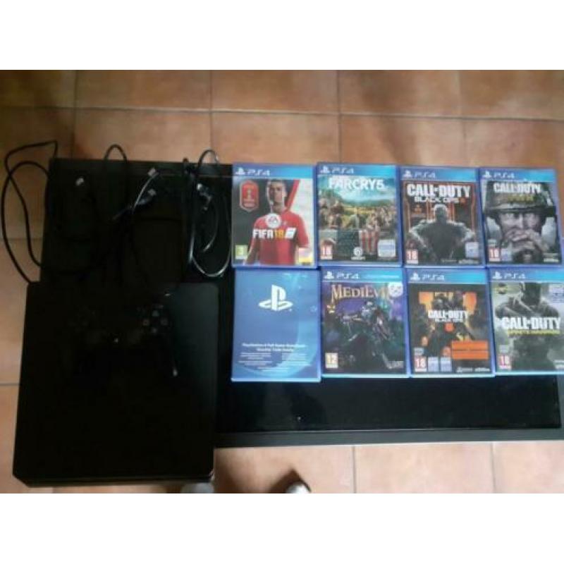 Playstation 4 slim 500Gb met 23 games