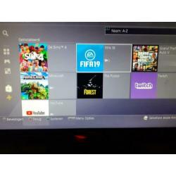 Playstation 4 slim 500Gb met 23 games