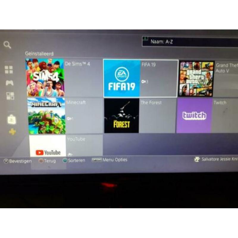 Playstation 4 slim 500Gb met 23 games