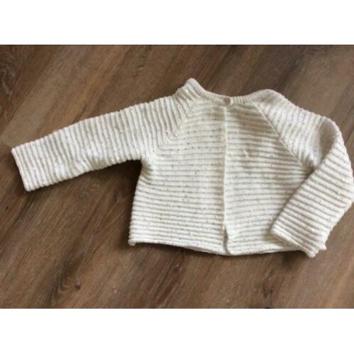 Wit vestje met glitters maat 122
