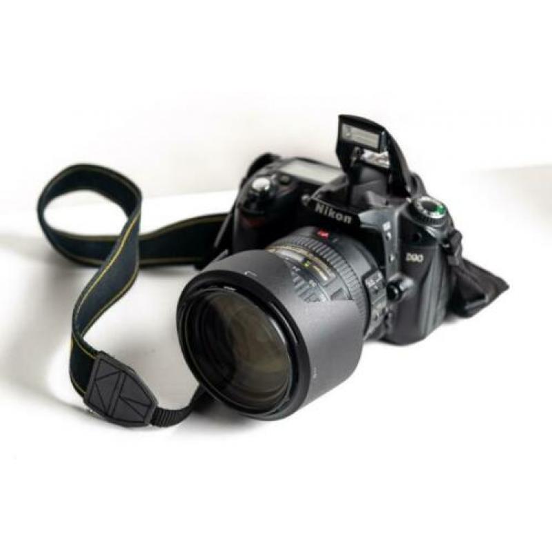 Nikon D90 met Nikkor lens DX SWM VR ED IF Aspherical 18-200