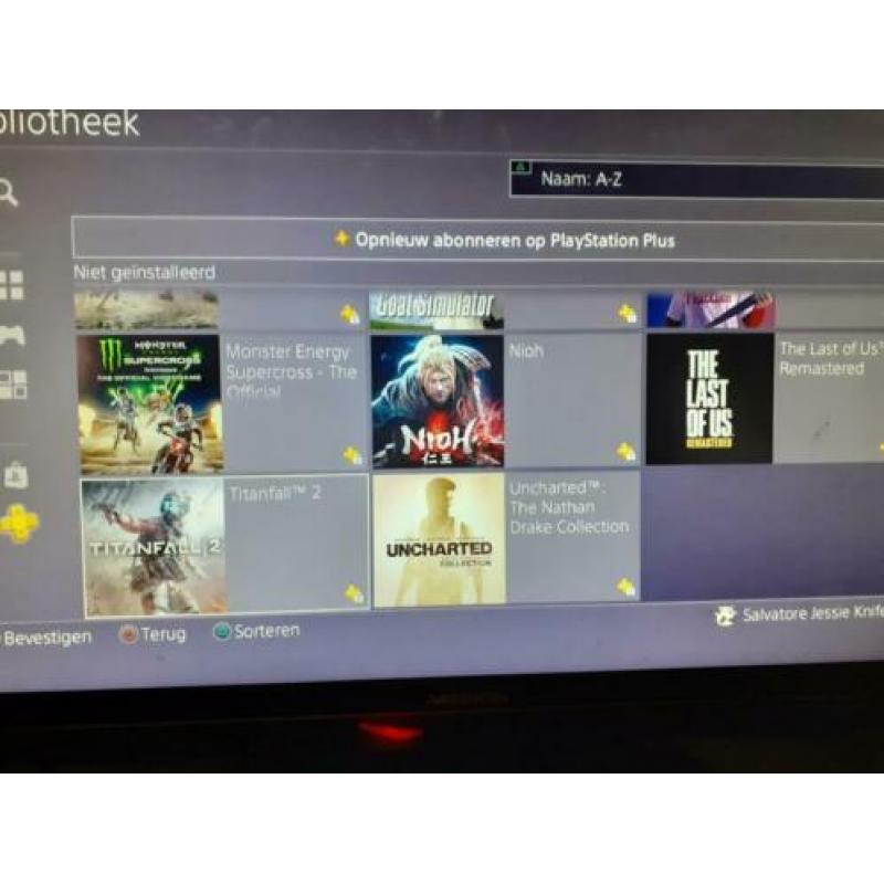 Playstation 4 slim 500Gb met 23 games