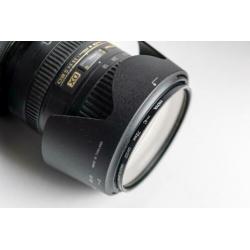 Nikon D90 met Nikkor lens DX SWM VR ED IF Aspherical 18-200