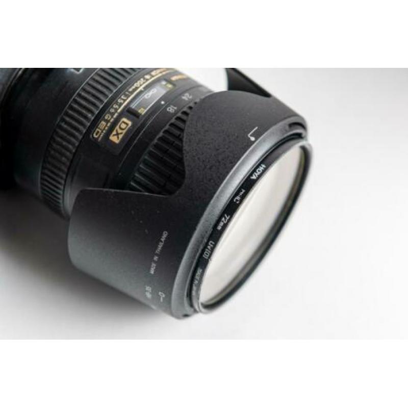 Nikon D90 met Nikkor lens DX SWM VR ED IF Aspherical 18-200