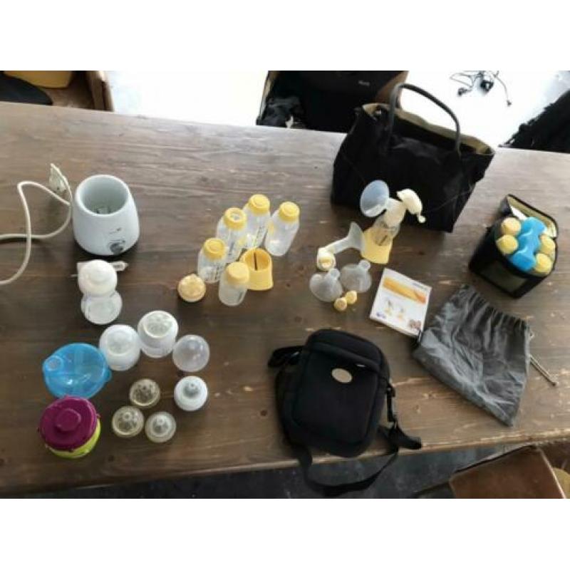 Medela handkolf, flessenwarmer en toebehoren