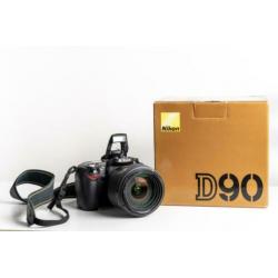 Nikon D90 met Nikkor lens DX SWM VR ED IF Aspherical 18-200