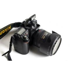 Nikon D90 met Nikkor lens DX SWM VR ED IF Aspherical 18-200