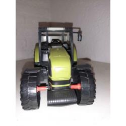 Mooie claas tractor met aanhangwagen