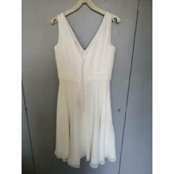 Te koop: Trouwjurk kort.