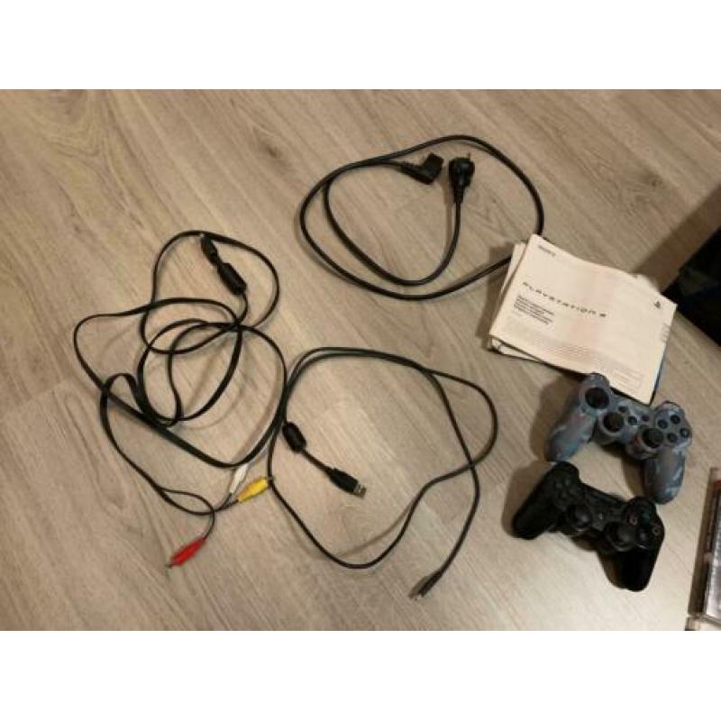 Playstation 3 Met twee controllers en Spellen