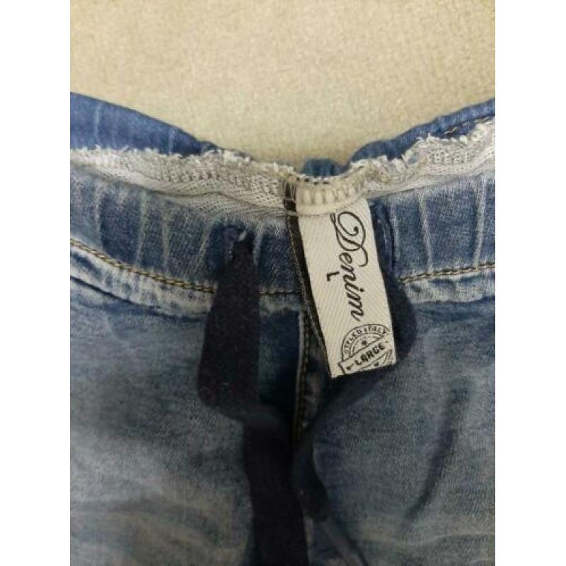 Jog jeans met elastische band ,bies op de pijp mt L