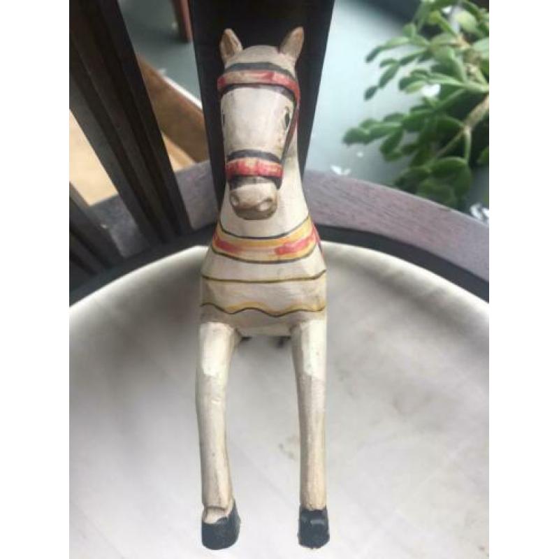 Antieke speelgoed houten paard. Afmeting: 17x15cm.