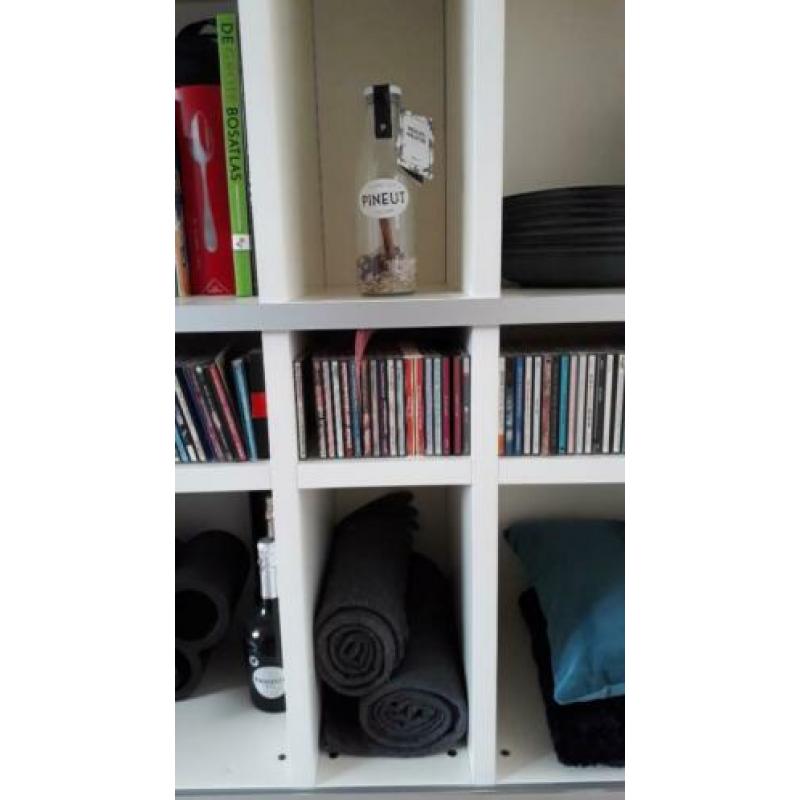 Grote witte design kast met schuifdeuren