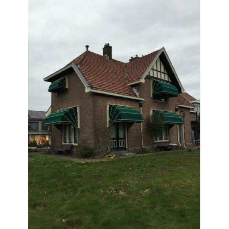 Markies herbekleden, nieuwe markiezen, zonwering, schermen.