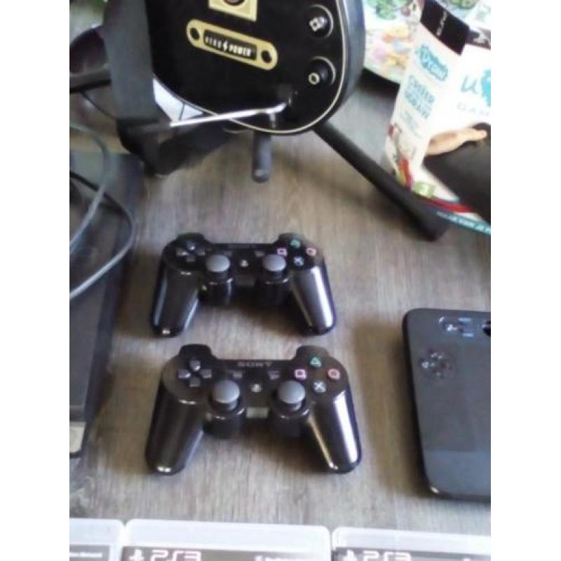 Zeer complete PS3 met Guitar Hero en U draw gametablet